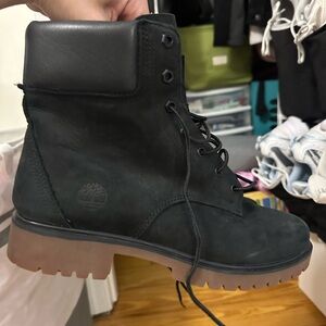 Black and brown Timberland boots. In great condition and worn twice